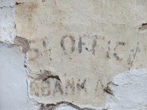 You can make out the words Post Office and Fairbank on mercantile building.